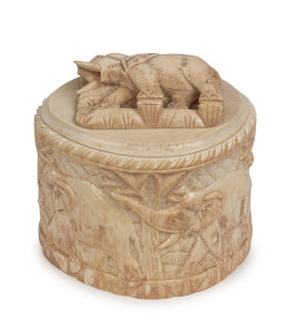 An Indian ivory jewellery box, carved with elephants and palms, 19th century, 9cm high, 10cm wide, 8.5cm deep