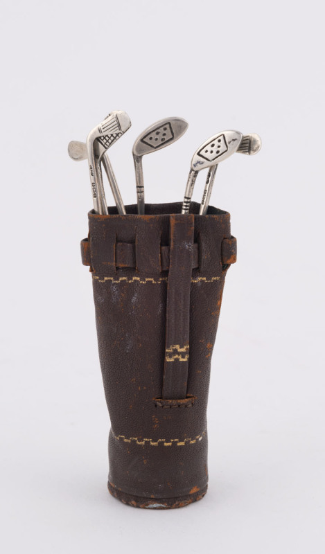 GOLFING INTEREST: A set of six English sterling silver cocktail skewers in the form of golf clubs in original leather golf bag, by Corfield & Co. Birmingham, circa 1929, 8.5cm high