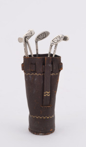 GOLFING INTEREST: A set of six English sterling silver cocktail skewers in the form of golf clubs in original leather golf bag, by Corfield & Co. Birmingham, circa 1929, 8.5cm high