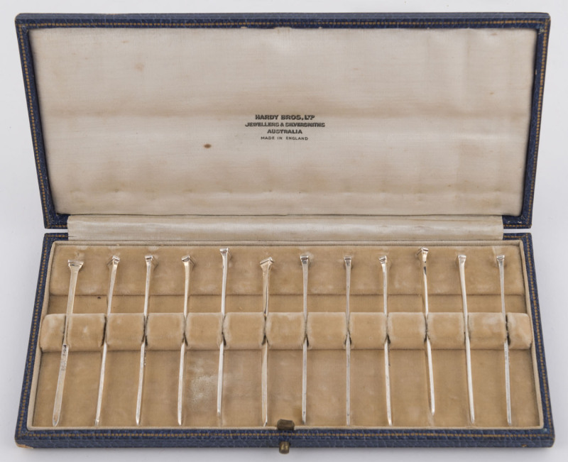 A set of 12 sterling silver oyster picks in original plush fitted case, made by Hardy Bros. for Hardy Bros. Australia, Birmingham, circa 1930, ​the case 19.5cm wide