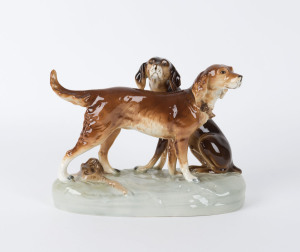 ROYAL DUX Austrian porcelain statue of hunting hounds, late 20th century, gold triangle foil label, 20cm high