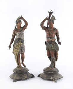 A pair of American Indian statues, cold painted spelter, 19th century, the taller 40cm high
