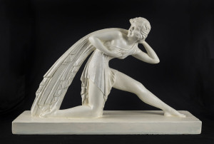 An Art Deco chalk ware statue, circa 1930s, 43cm high, 70cm wide