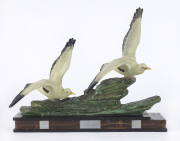 A French Art Deco statue of two gulls, painted cast metal in marble base, circa 1930, ​35.5cm high, 44cm wide