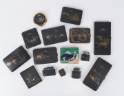 Group of ten Japanese cigarette and cigar cases, three lighters, a powder compact and a miniature music box, 20th century, (15 items), ​the largest 17cm high