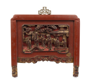 A Chinese panel showing monks and a temple, red lacquered and gilded carved timber, 19th/20th century, ​33 x34cm