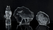 MATS JONASSON Swedish crystal owl and moose ornaments, together with a Goebel German crystal owl statue, 20th century, (3 items), the largest 17.5cm high