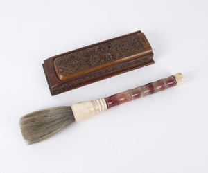 A Chinese calligraphy brush made from bristle, agate and bone; together with a carved wooden brush box with inscription, 19th/20th century, (2 items), the brush 38cm long