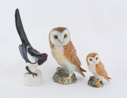 A Soviet Russian porcelain "Eurasian Magpie" statue, together with two Beswick porcelain owl statues, mid 20th century, (3 items), ​the magpie 25.5cm high