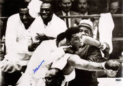 MUHAMMAD ALI, signed photograph from the Muhammad Ali vs Sonny Liston fight, February 25th 1964, size 51x36cm. With 'Online Authentics' No.OA-0000180.