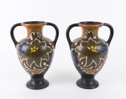 GOUDA Dutch Art Deco pair of pottery vases with floral motif, circa 1925, signed "602, Nadro, Gouda, Made In Holland", 26cm high