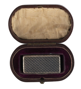 A Russian silver and niello vinaigrette with gilt finished compartment interior, 19th century, housed in a plush fitted box, no maker's marks visible, 4.75cm wide