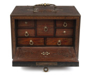 An Anglo-Indian spice box, padouk and sandalwood sumptuously inlaid with brass, bone, silver and ebony, interior fitted with seven staggered drawers, with original key, late 18th early 19th century, 13cm high, 19cm wide, 13cm deep - 2