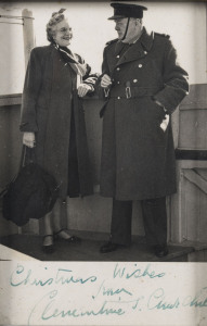 CLEMENTINE & WINSTON CHURCHILL: photograph of Clementine alongside a uniformed Winston Churchill, signed seasonal greeting beneath reading "Christmas Wishes from Clementine S. Churchill", framed & glazed, overall 14x19cm.