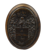 JOHN OBRISSET pressed horn oval box with Sir Francis Drakes coat of arms, early 18th century, 3cm high, 8cm wide, 10cm deep. PROVENANCE: Christie's, The Duchess of Westminster Eaton Hall, Sept. 21st, 2004.