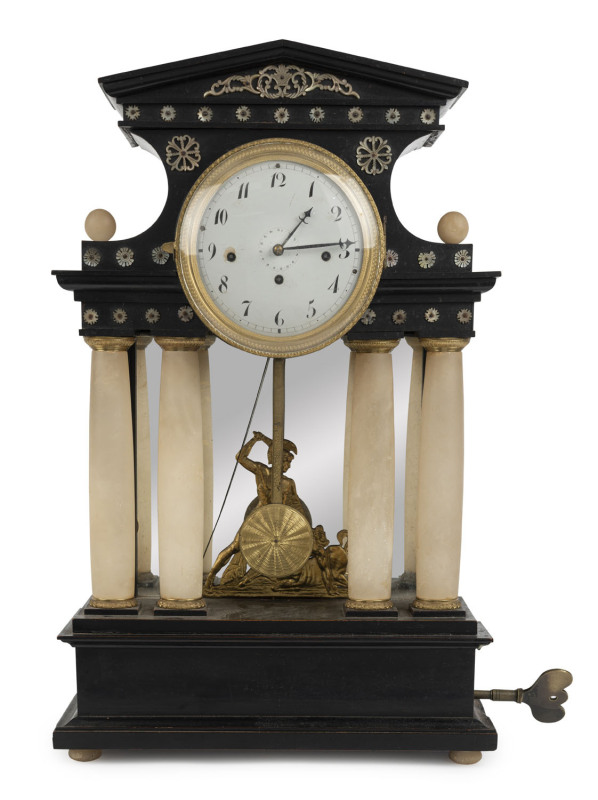Viennese mantel clock, time and strike with gong and calendar dial, rare music box mechanism in base, ebonized wooden case adorned with mother of pearl, gilt metal and alabaster columns, late 18th early 19th century, ​56cm high