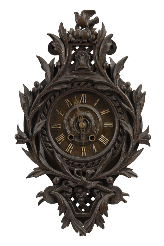 A Black Forest wall clock, time and strike movement in carved timber case, late 19th century, ​50cm high