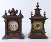 JUNGENS mantel clock and an Ansonia cabinet clock, both in carved walnut cases, late 19th century, ​47cm and 38cm high