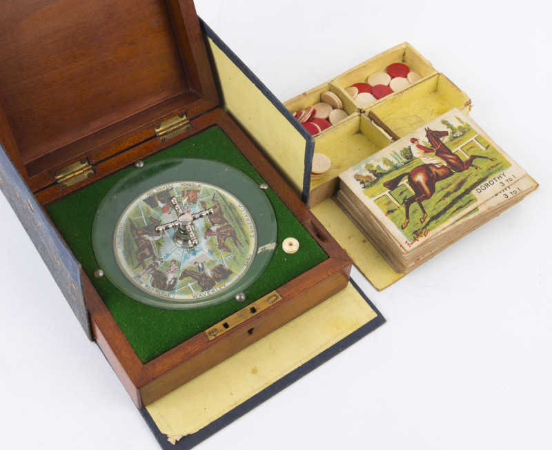 c.1920 Sandown Horse Racing "spinner" game by F.H. Ayres Lts (London) presented in polished wooden box, with gambling chips and illustrated betting cards showing the odds for the competing horses; comes with original box and scarce thus.