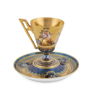 ROYAL VIENNA Austrian porcelain cabinet cup and saucer decorated hand-painted allegorical scenes, signed J. Neuman, blue beehive mark to base, 19th century, (2 items), the saucer 15cm diameter