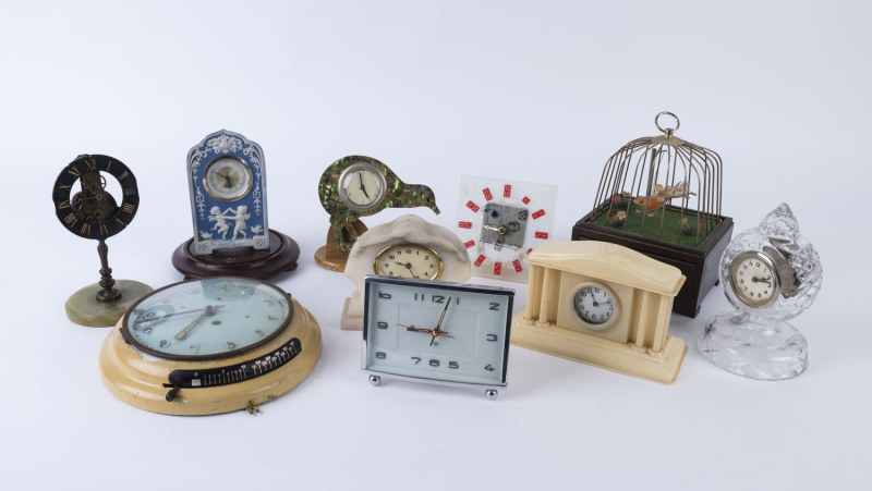 Ten assorted clocks including bird cage, wall clock, crystal clock, jasper ware porcelain case, kiwi bird etc, 20th century, ​the wall clock 24cm diameter