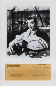 CLARK GABLE: mounted display featuring iconic Gone with the Wind image of Gable as Rhett Butler playing cards, beneath is Gable's signature on a 1949 First National Bank of Los Angeles cheque, CofA affixed to reverse; framed & glazed, overall 47x30cm.