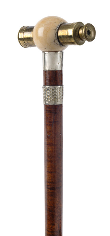 A novelty antique walking stick, blackwood shaft with expanding brass telescope handle mounted in ivory with nickel collars, 19th century, ​80cm high