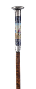 A fine French walking stick with fiddleback shaft silver cap and collar and Sevres porcelain handle, 19th century, 90cm high