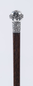 An antique walking stick, palmwood shaft with sterling handle, 19th century, 81cm high