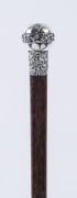 An antique walking stick, palmwood shaft with sterling handle, 19th century, ​81cm high