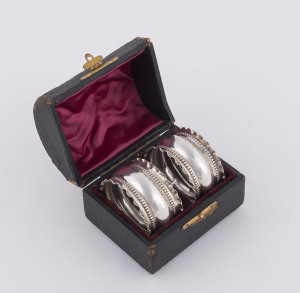 A pair of English sterling silver napkin rings in original plush fitted box, Birmingham, circa 1906, ​4.5cm diameter