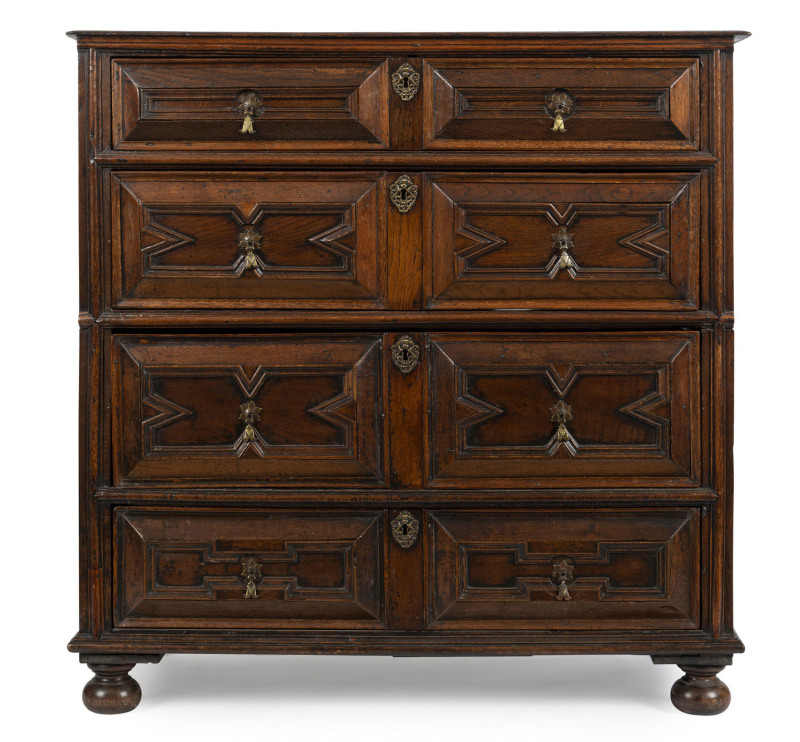 A Charles II English oak chest of drawers, 17th century, peg joint construction with oak back boards, splits into two section, 112cm high, 112cm wide, 53cm deep