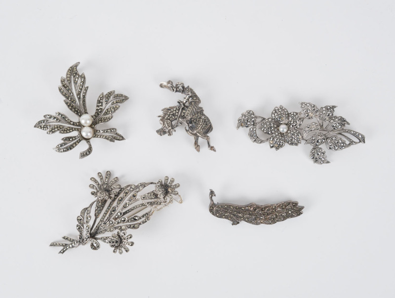 Five vintage brooches, silver and marcasite (two set with pearls), circa 1930s, the largest 9.5cm high