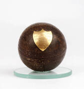 TROPHY CRICKET BALL: c1887 Cricket Ball with gold shield engraved "Armfield & Lang's Trophies. Used in the final Match. St.George v Clyde.Presented to Mr H.Auty, in recognition of his unwearied exertions in behalf of St.George C.C.". [The Armfield & Lang'