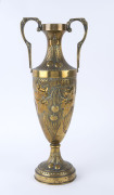 A Continental brass urn with repouss&eacute; cherry decoration, circa 1900, signed near base (illegible), ​48.5cm high