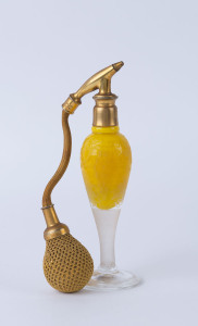 A French Art Deco perfume atomiser, circa 1925, remains of Paris paper label on the base, 16.5cm high
