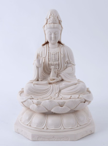 A Chinese seated Guan Yin Blanc De Chine porcelain statue, late 20th century, seal mark to back, 38cm high