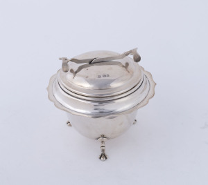 An English sterling silver sugar bowl with "S.O.S." Pascall's patent sugar nip lid with concertina scissor action, made by John Turton & Co. Sheffield, circa 1928, 10cm high, 200 grams