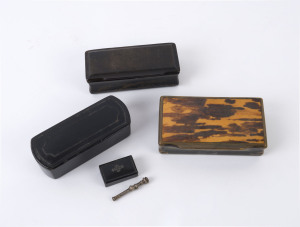 Three snuff boxes, two black papier-mâché and one horn and tortoiseshell, 18th century, the largest 10cm wide