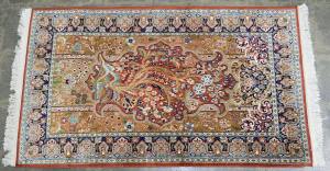 A Persian hand-woven silk rug, late 20th century, ​172 x 93cm