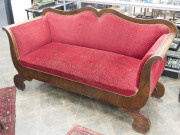 A Biedermeier double ended settee, early 19th century, 95cm high, 103cm across the arms, 66cm deep