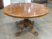 A Victorian supper table with tilting top, burr walnut, circa 1875 74cm high, 134cm wide, 101cm deep