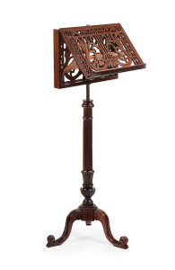 A double-sided music stand, carved mahogany and brass, 20th century, ​123cm high