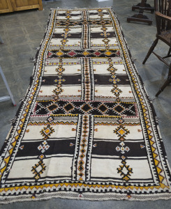 An Afghan tribal rug, mid 20th century, 370 x 130cm