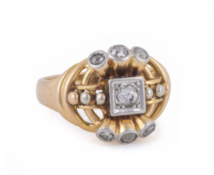 An antique French gold ring set with seven diamonds, early 20th century, 6 grams