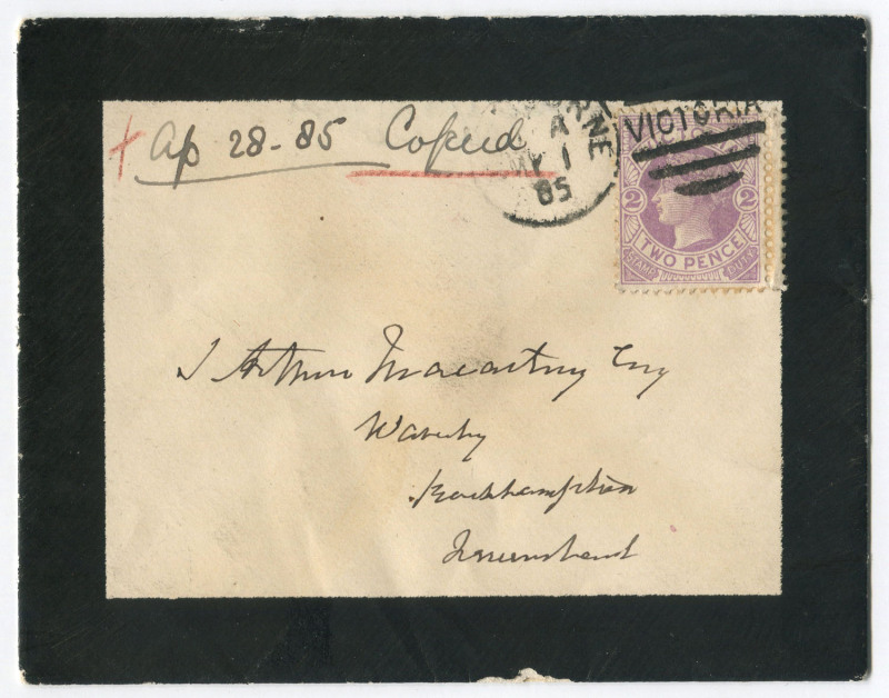 VICTORIA - Postal History: 1885 (May 1) Macartney mourning cover from Melbourne with 2d lilac SG.298 with DOUBLE PERFS at right tied by duplex cancel, on reverse BRISBANE, MARYBOROUGH & ROCKHAMPTON (arrival) transit backstamps. Unusual.