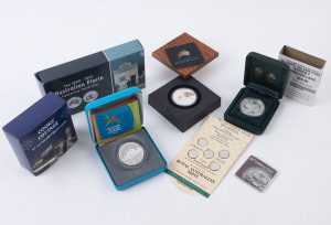 Coins - Australia: Silver: 2000-2010 selection of mostly silver proofs comprising 2000 Olympics $5 Harbour Land, 2006 Discover Australia $1, 2006 Melbourne Commonwealth Games $5, 2009 Cooks' Cottage $1, 2009-2010 Australian Florin Centenary comprising two Cook Islands 1oz silver proofs, and replicas of 1909 &1910 florins; also 1927 Canberra florin VF and 1990 RAM Christmas Pudding pack. (7 items)