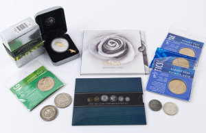 Coins - Australia: Selection with 1937 Crown (2), 50c Round, 2000 Sydney Olympics $5 Medallions (4), 2007 $1 Silver Kookaburra, 2010 uncirculated coin set, also 1931 Florin forgery and British Royal Mint Lady Diana memorial coin. (10 items)