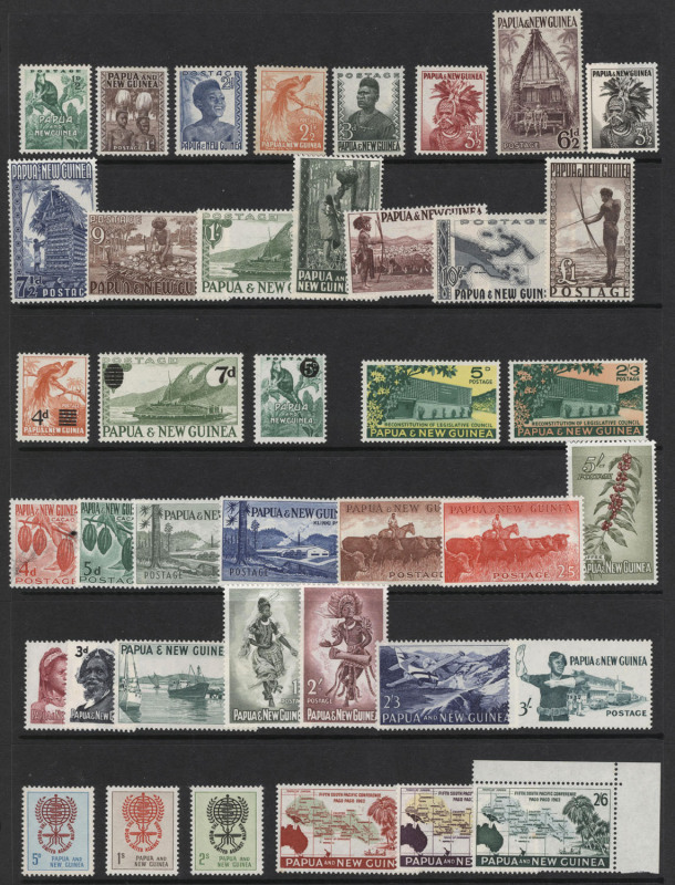 PAPUA NEW GUINEA: 1952-96 mostly MUH (few hinged items) collection incl. 1952 Pictorial set to £1, 1963 10/- Rabaul & £1 Queen, plenty of later definitive and commemorative sets plus surcharge multiples 1994 65t on 70t Anemone Fish block of 20 & 1998 25t