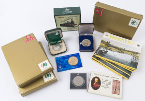 Coins - Australia: 1970-2000s small accumulation with 1988 First Fleet uncirculated coin sets (6, retail $120), 1988 First Fleet proof set (3, retail $150), 1978 Bicentenary silver proof, 1988 Holey Dollar & Dump silver coins, 2004 Steam Railways $5 silve